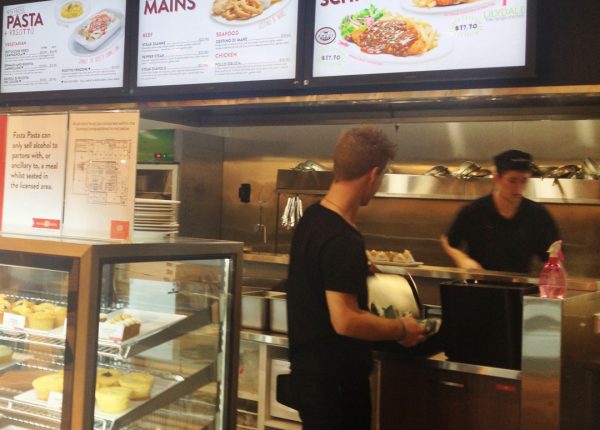 Menu board digital signage at Fasta Pasta restaurant.